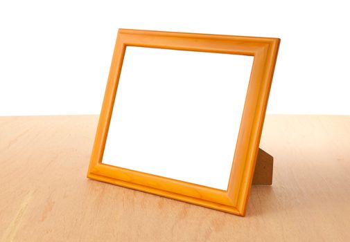 Photo frames on the table and white background