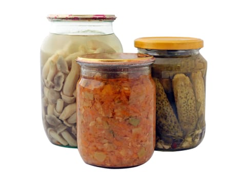 sealed jars with mushrooms, cucumbers and marrow paste