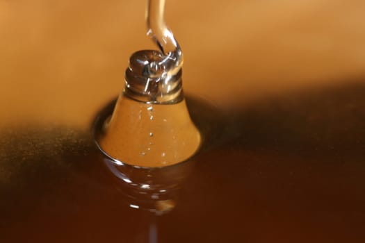 close up of pouring honey