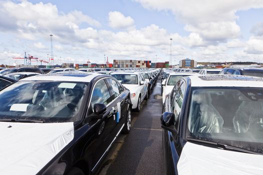 Large group of cars waiting for transport