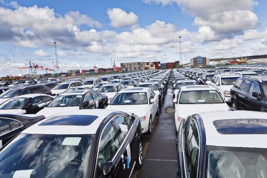 Large group of cars waiting for transport