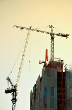 Crane on the building site under construction