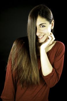 Young female model with amazing straight long hair smiling