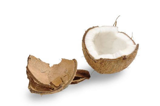 Fresh coconut and coconut shells. Isolated on white.