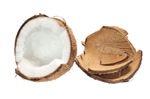 Fresh coconut and coconut shells. Isolated on white.