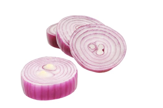 РЎhopped red onion circles. Isolated on white.