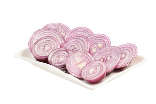 РЎhopped red onion circles. Isolated on white.