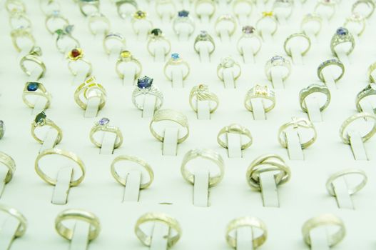 many jewellery rings in an outlet