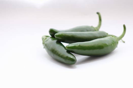 Green immature jalapeno peppers ready to be used in Mexican food.