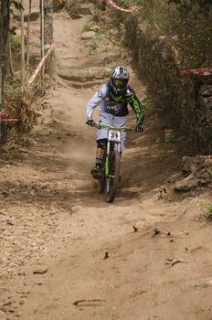 VIANA DO CASTELO, PORTUGAL - MAY 13: Rui Domingues during the 4th Stage of the Taca de Portugal Downhill Vodafone on may 13, 2012 in Viana do Castelo, Portugal.