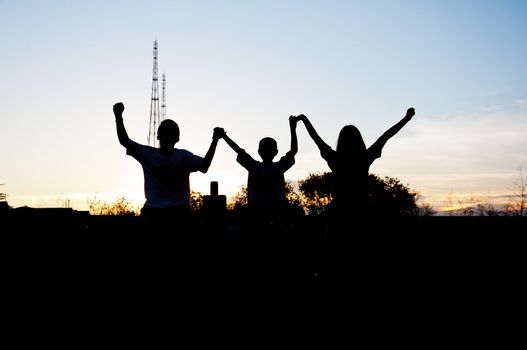 silhouette of children happy and victory