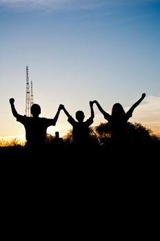 silhouette of children victory