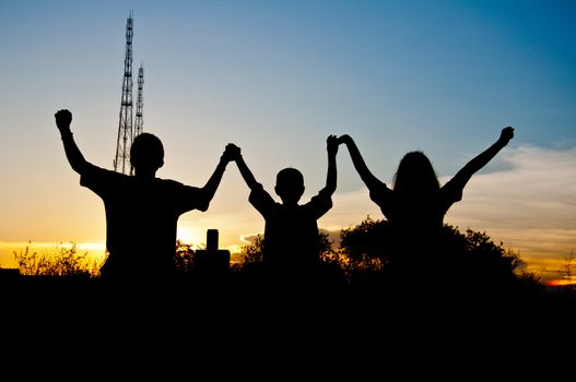 silhouette of children victory and happy