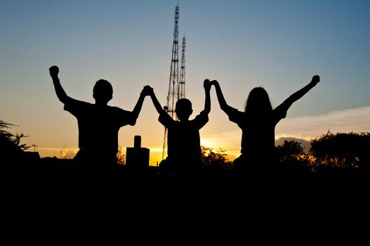 silhouette of children victory and happy