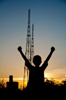 silhouette of boy happy and victory