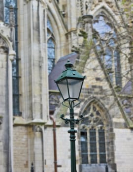 Street lamp on the background of the church