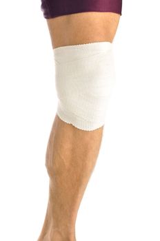 Leg of male athlete wrapped in bandage