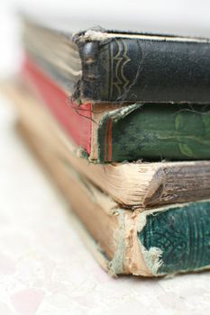 close-up of a stack of old books, very shallow DOF!...........
