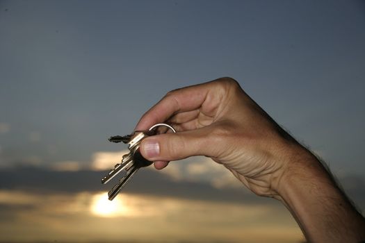 Hand holding keys