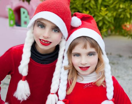 Christmas santa costumer kid girls makeup portrait smiling outdoor