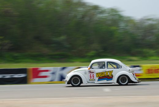 Nakhon Ratchasima, Thailand - March 9th:Unidentified car racing competitors during the "Thailand circuit 2013  " at Bonanza speedway on March 9th, 2013 in Nakhon Ratchasima, Thailand. 