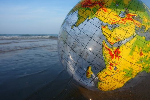 Globe ball at the ocean. on a sunny day