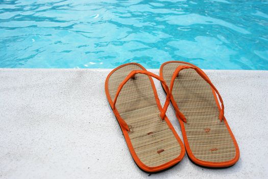 Sandals at the pool on a very sunny day