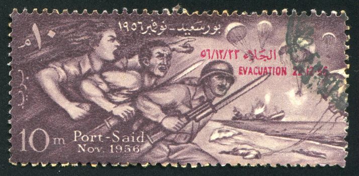EGYPT - CIRCA 1956: stamp printed by Egypt, shows Egyptians Defending Port Said, circa 1956