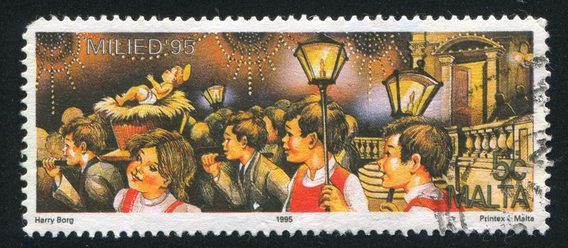 MALTA - CIRCA 1995: stamp printed by Malta, shows Christmas Eve, Children's Procession, circa 1995