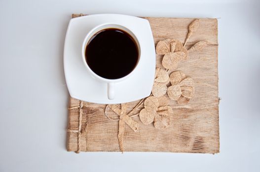 black coffe and paper on white background