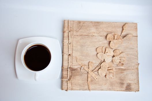 black coffe and paper on white background