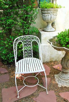 White chair in the garden