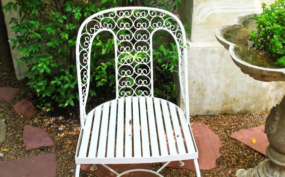 White chair in the garden