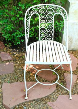 White chair in the garden