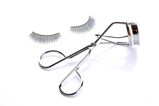 fashion fake false eyelash with curler isolated on white background