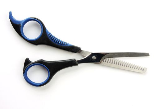 Hair scissors on the white background