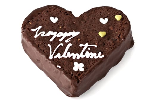 Heart shaped slice of a brownie on white background