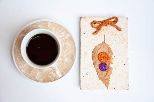 black coffe and paper on white background