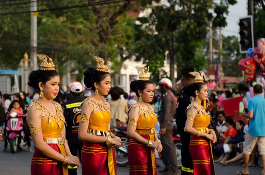 Phetchaburi, Thailand - March 28th:participants in Phranakhonkhiri festival parade 2013 on public street in front of Khao Wang  Phetchaburi on March 28th, 2013 in Phetchaburi Province, Thailand. 