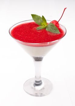 cocktail with cherry and strawberry jam on a white