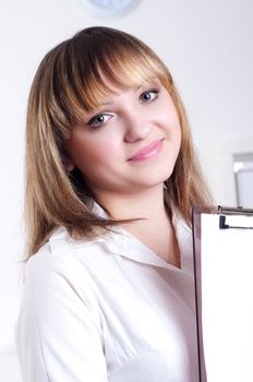 cute woman with tablet in office, portrait