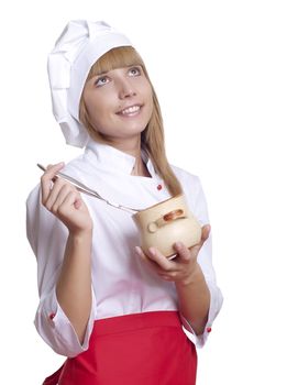 beautiful woman hold a pot of food, checks cooked