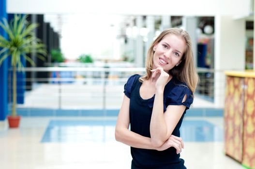 cute  woman smile in the trade center