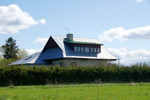 The modern house on a background of sky