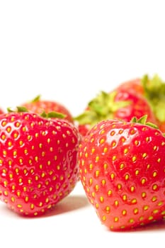 appetizing brightly red strawberries on a white background