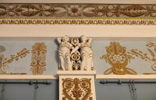 Fragment of the ancient palace interior the wall and molding