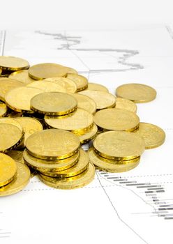 Golden coins concept on business background