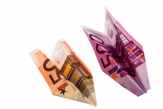 Paper planes from money advantage 50 and 500 on a white background