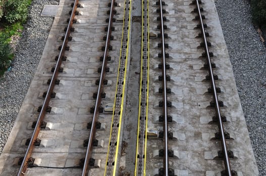 Concrete paved metal tracks of urban electric railway.