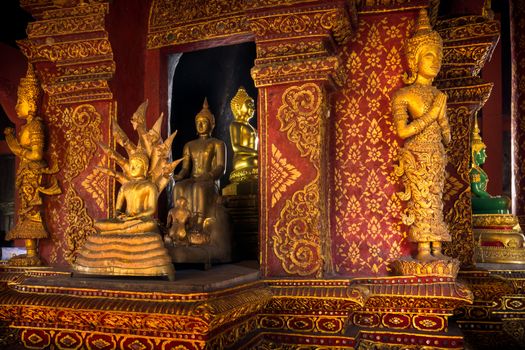 Many Buddha statue in church at Phra Singh Temple, Chiang Mai, Northern Thailand